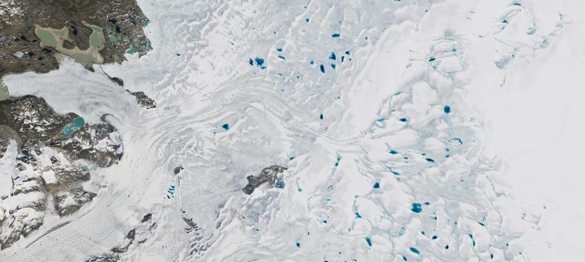 A satellite image of an icy lake taken by the OLI 2 instrument aboard Landsat 9.
