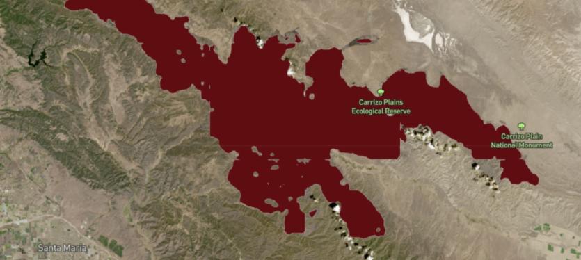 A map of a burn scar northwest of Los Angeles, generated by the Prithvi-EO artificial intelligence model. A red patch represents the burn scar.