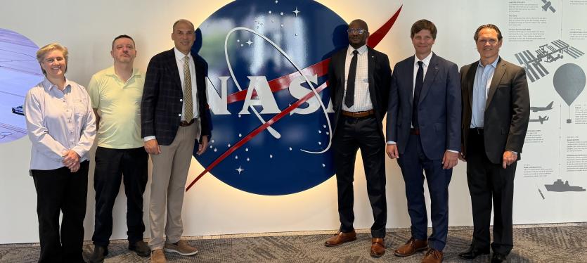 Key personnel in the NASA-AWS open data collaboration. From left to right: Chris Stoner (AWS Open Environmental and Geospatial Data Lead), Doug Newman (NASA ESDIS Science Data Systems Lead), Dave Appel (AWS Vice President of Global Government), Andrew Mitchell (NASA Deputy Chief Science Data Officer), Kevin Murphy (NASA Chief Science Data Officer/Acting Chief Data Officer and Chief AI Officer), and Jamie Baker (AWS Director of Global Civilian Health, Science, and Public Policy).