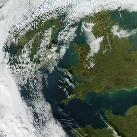 Sweeping across Scotland and Ireland, the clouds form a series of ripples that look just like waves hitting the shoreline.