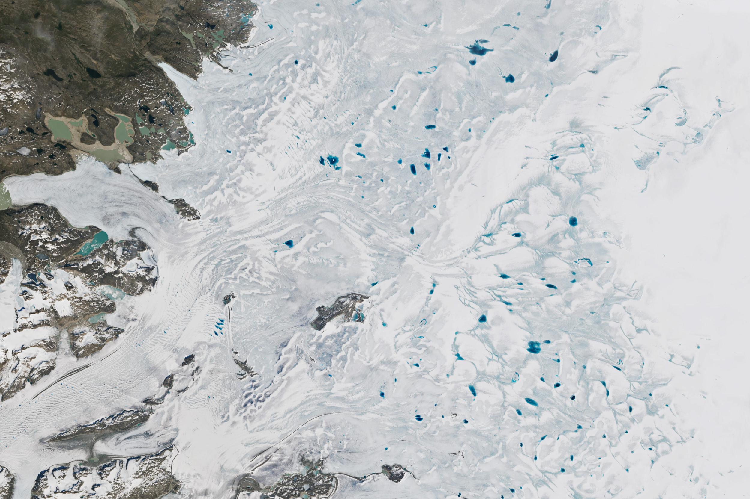 A satellite image of an icy lake taken by the OLI 2 instrument aboard Landsat 9.