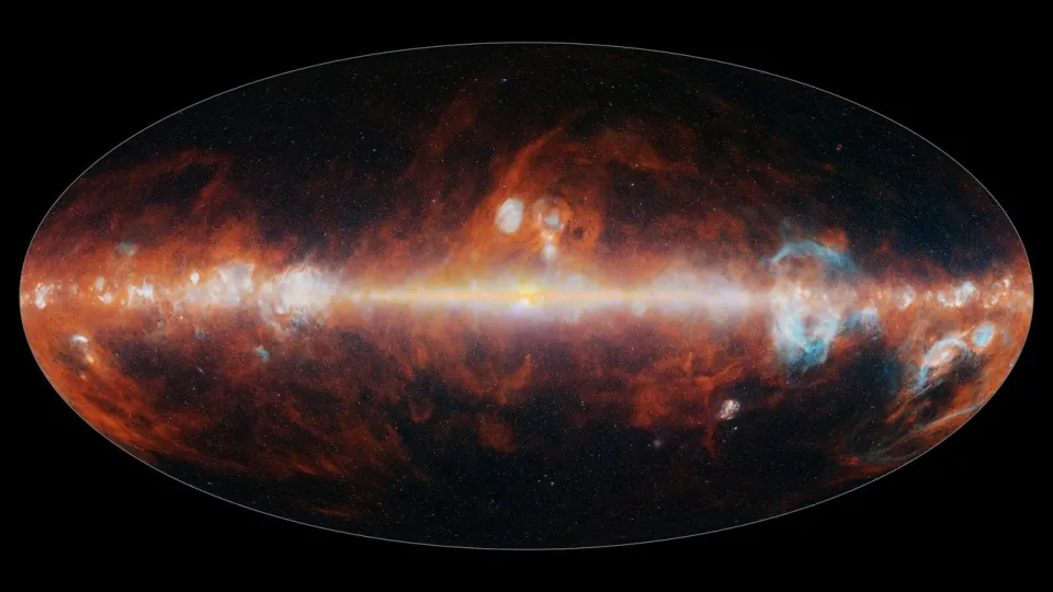 NASA'S SPHEREX has mapped the entire sky in 102 infrared colors, which are invisible to the human eye but can be used to reveal different features of the cosmos. This image features a selection of colors emitted primarily by stars (blue, green, and white), hot hydrogen gas (blue), and cosmic dust.